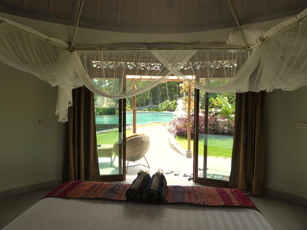 Puri Dajuma Beach Eco-Resort & Spa Пулукан Екстериор снимка