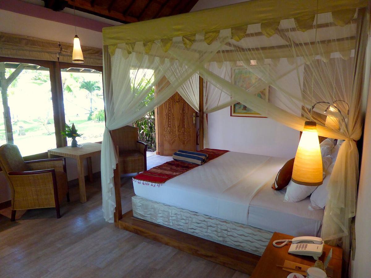 Puri Dajuma Beach Eco-Resort & Spa Пулукан Екстериор снимка